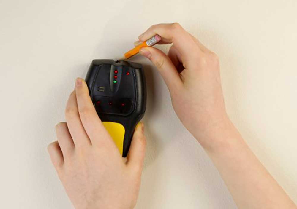 How to Safely Use a Stud Finder